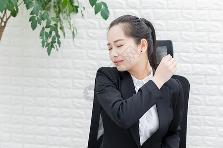 商务女性肩颈酸痛高清图片