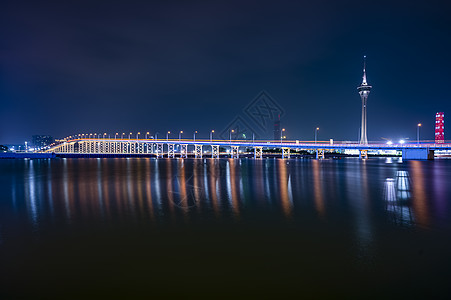 海边城市夜景夜景澳门西湾大桥背景