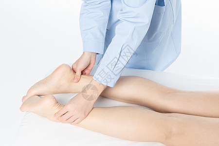 女性腿部按摩背景图片