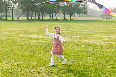 儿童节女孩公园放风筝图片