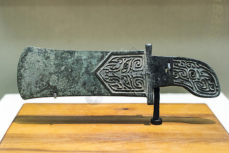 兽面纹青铜刀具背景图片