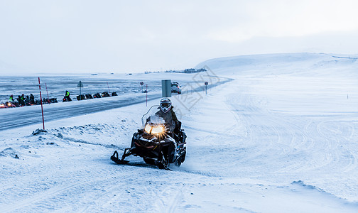 雪地探险北极户外雪地摩托探险背景