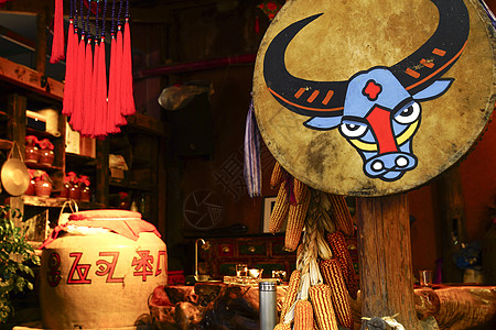 云南少数民族图腾餐厅背景图片