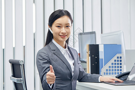 美女蓝牙耳机女性客服背景