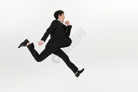 商务男性夸张奔跑背景图片