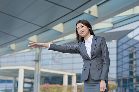 商务女性机场打车图片