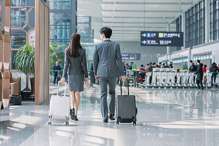 旅行背影商务男女机场背影背景