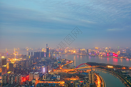 城市两江交汇处夕阳江景夜景图片