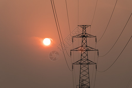 夕阳下的电线杆背景图片