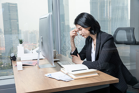 绝望的女人职场女性办公室办公背景