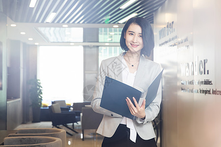 拿文件女人职场美女背景