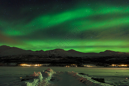 特罗姆瑟美丽的北欧冬季北极光背景
