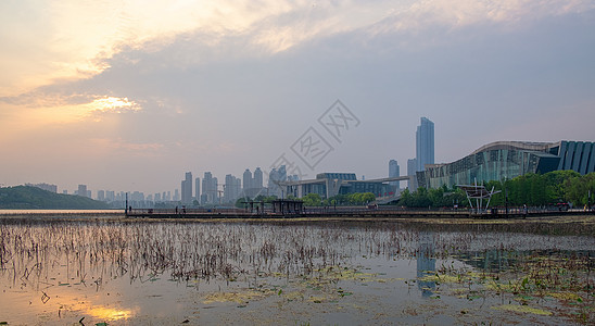 城市夕阳晚霞湖景全景长片都市高清图片素材