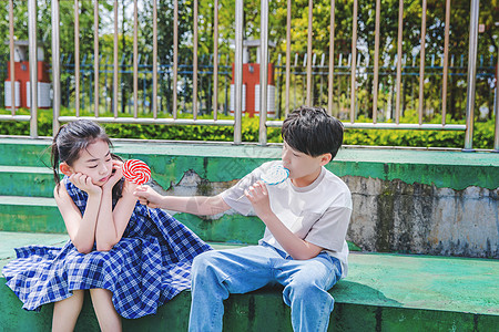 小学生分享棒棒糖背景图片