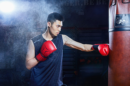 运动手套产男性拳击运动员背景