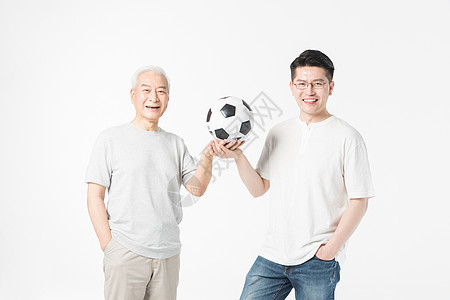 父亲节世界杯老年父子手拿足球背景