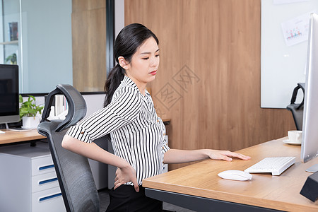 职场女性腰疼背景图片
