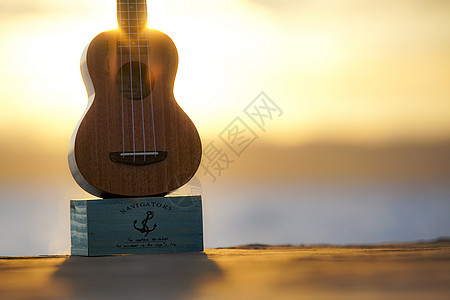 海边夕阳吉他图片