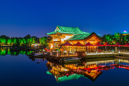 济南地标济南大明湖夜景背景