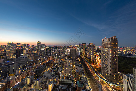 东京塔日本东京城市夜景日落背景