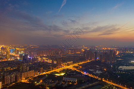 夕阳晚霞城市夜景道路图片