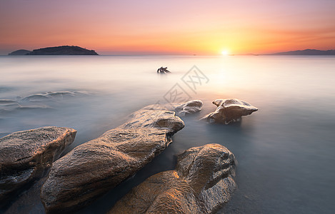 夕阳海滩海岸风光背景