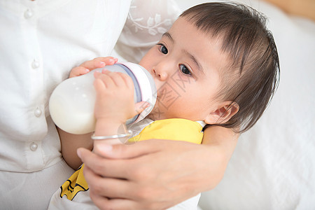 宝宝吃奶粉母婴妈妈给宝宝喂奶背景
