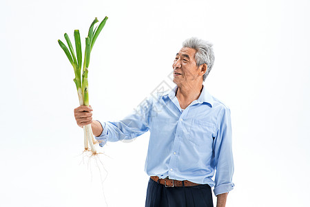 菜农展示蔬菜图片