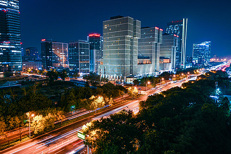 北京万达广场夜晚车轨背景图片