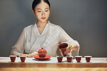 红色室内室内女茶艺师背景