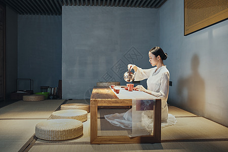 古风室内素材坐垫女茶艺师注水背景