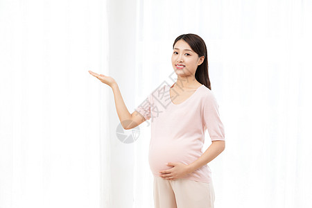 孕妇做饭居家孕妇背景