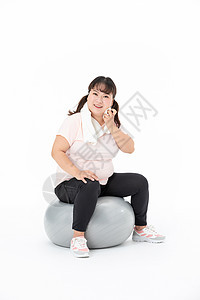 胖女生运动休息背景图片