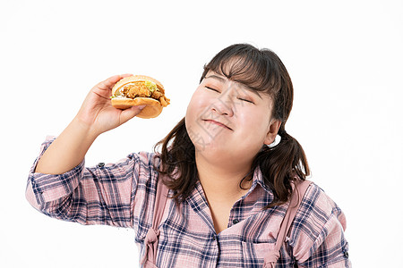 胖女孩开心吃汉堡图片素材