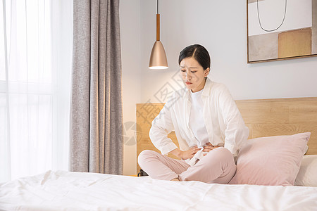 浴袍 美女女性痛经背景