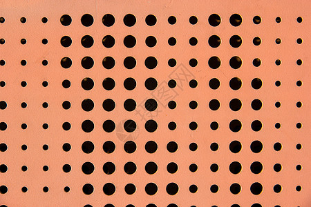 橙色的几何圆孔背景素材图片