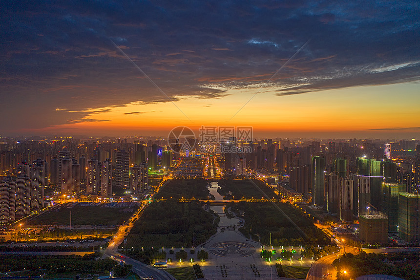 江西九江城市中轴线夕阳晚霞天空夜景图片