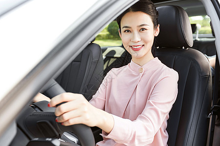 汽车司机年轻女性驾车背景