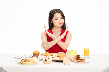 美女抵挡美食诱惑高清图片