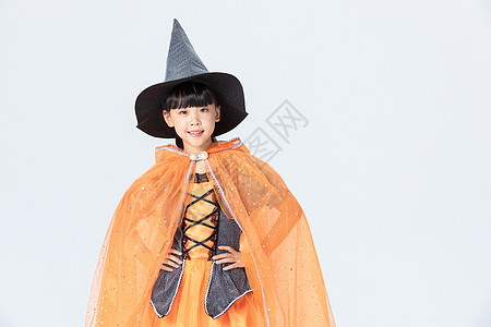 可爱小女孩万圣节女巫打扮背景图片
