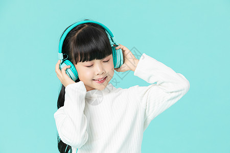 音乐儿童可爱小女孩听音乐背景