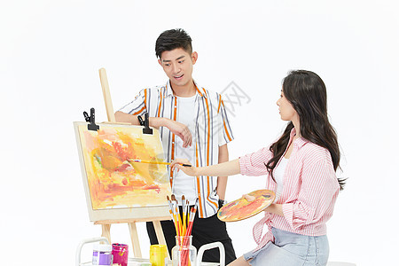 帅哥看女画家创作图片