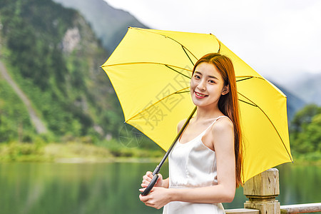 美女户外撑伞打伞形象 背景图片