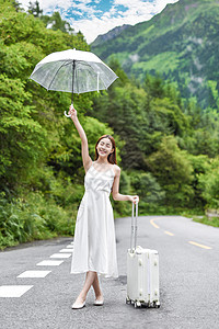 美女户外撑伞打伞形象 图片