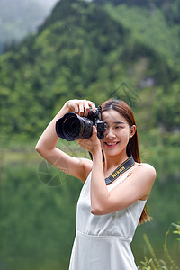 美女旅行相机拍照图片