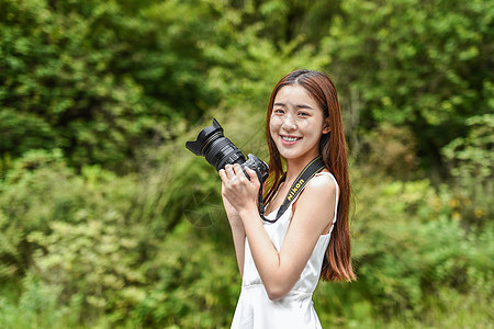 女生拍摄风景美女旅行相机拍照背景