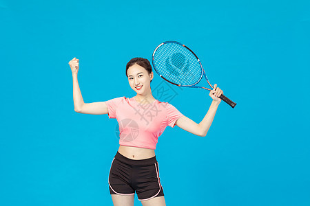 运动女性打网球背景图片