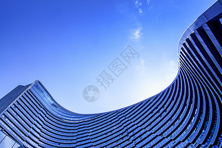 蓝天白云楼房北上广高层大楼建筑设计感曲线线条背景