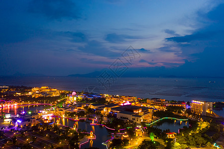 广东珠海海景酒店夕阳晚霞夜景背景图片