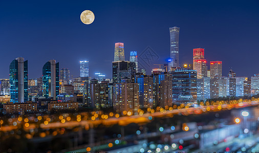 模糊夜景中秋节的北京国贸大厦背景